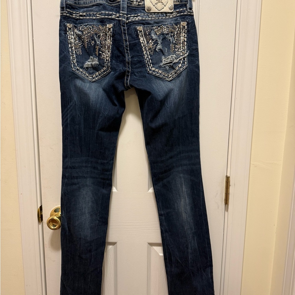 Miss Me Mid Rise Easy Skinny Sparkly Pocket Blue Jeans from The Buckle